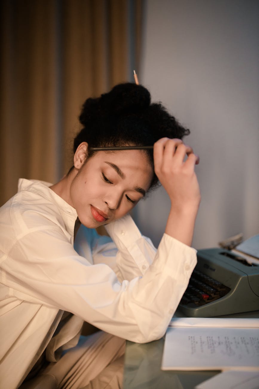 Person working at a desk looking relaxed and focused